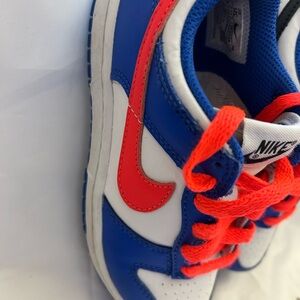 Nike Kids White and Blue Sneakers with Red Accents